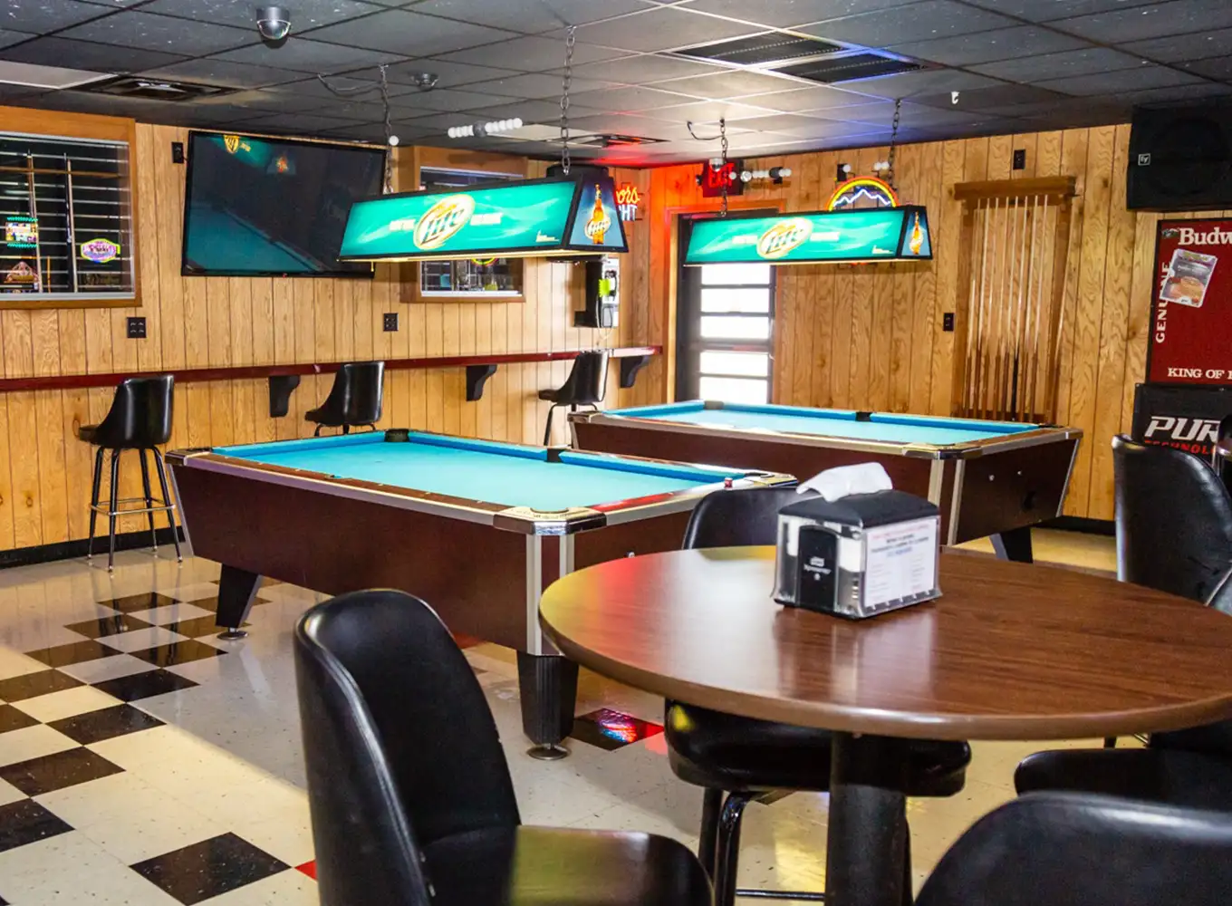 2 pool tables in the back of a local decatur illinois bar and grill